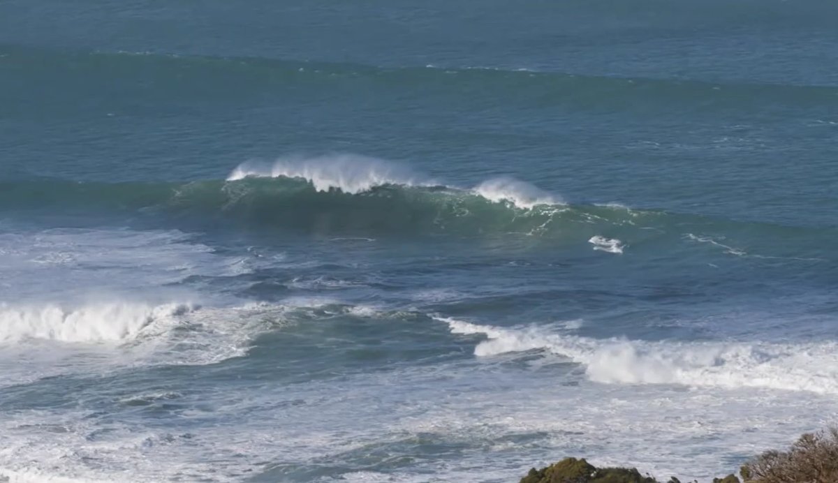 A big set detonates off the reef, raw Southern Ocean power, Papatowai surf spot, Catlins / South Otago, New Zealand.